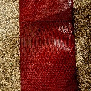 Burgundy reptile clutch